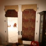 A door with Brown Color Curtains